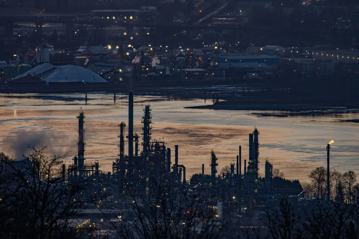 Fuel storage terminal at dusk, an energy sector setting